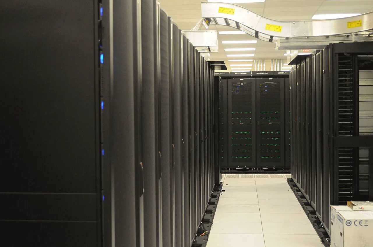 Enterprise cloud mining deployment spanning multiple high-density aisles