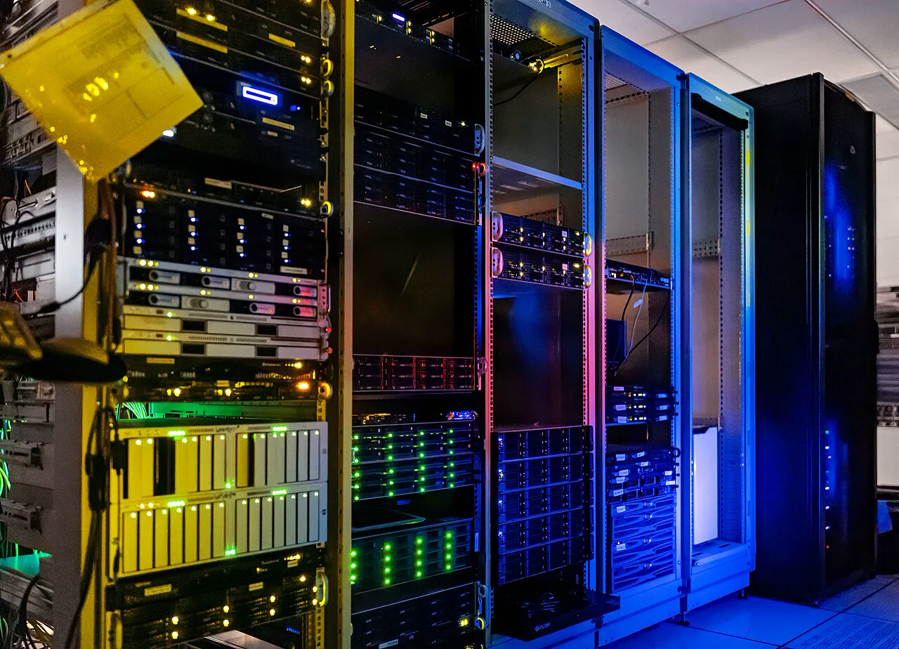 High-density professional ASIC mining rack with violet and cyan accent lighting